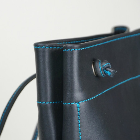 Talego color negro cosido en turquesa