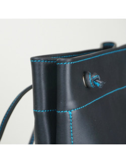 Talego color negro cosido en turquesa