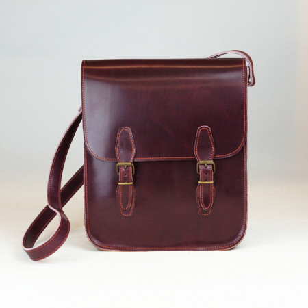 Holanda vertical con 2 hebillas en color burdeos y cosida en naranja