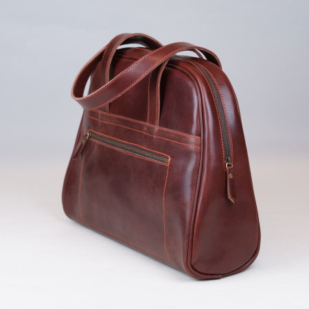 Carlota en color tabaco cosida en naranja