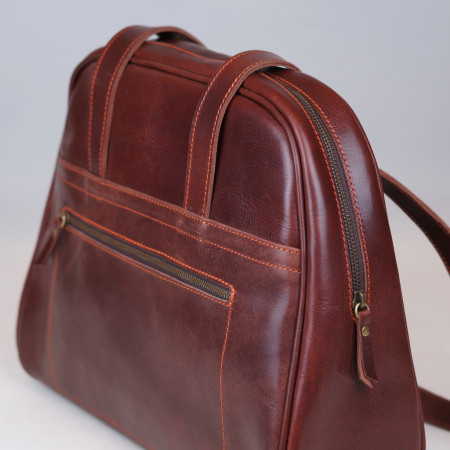 Carlota en color tabaco cosida en naranja