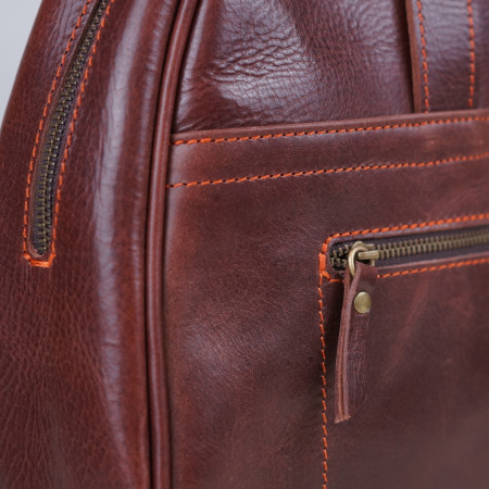 Carlota en color tabaco cosida en naranja