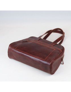 Carlota en color tabaco cosida en naranja