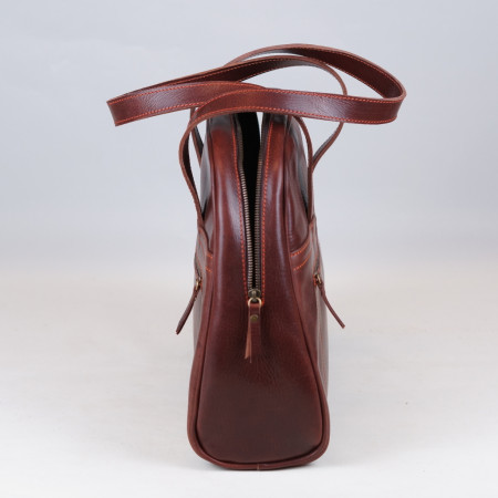 Carlota en color tabaco cosida en naranja