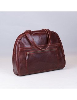 Carlota en color tabaco cosida en naranja